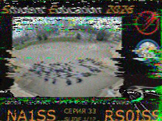 SSTV-Bild Slide 1 mit deutlichen Störstreifen, im Browser ohne Nachführung dekodiert
